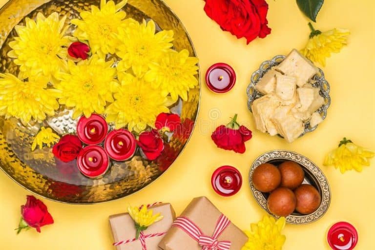 diwali-festival-background-flowers-traditional-sweets-candles-diwali-festival-background-129298103